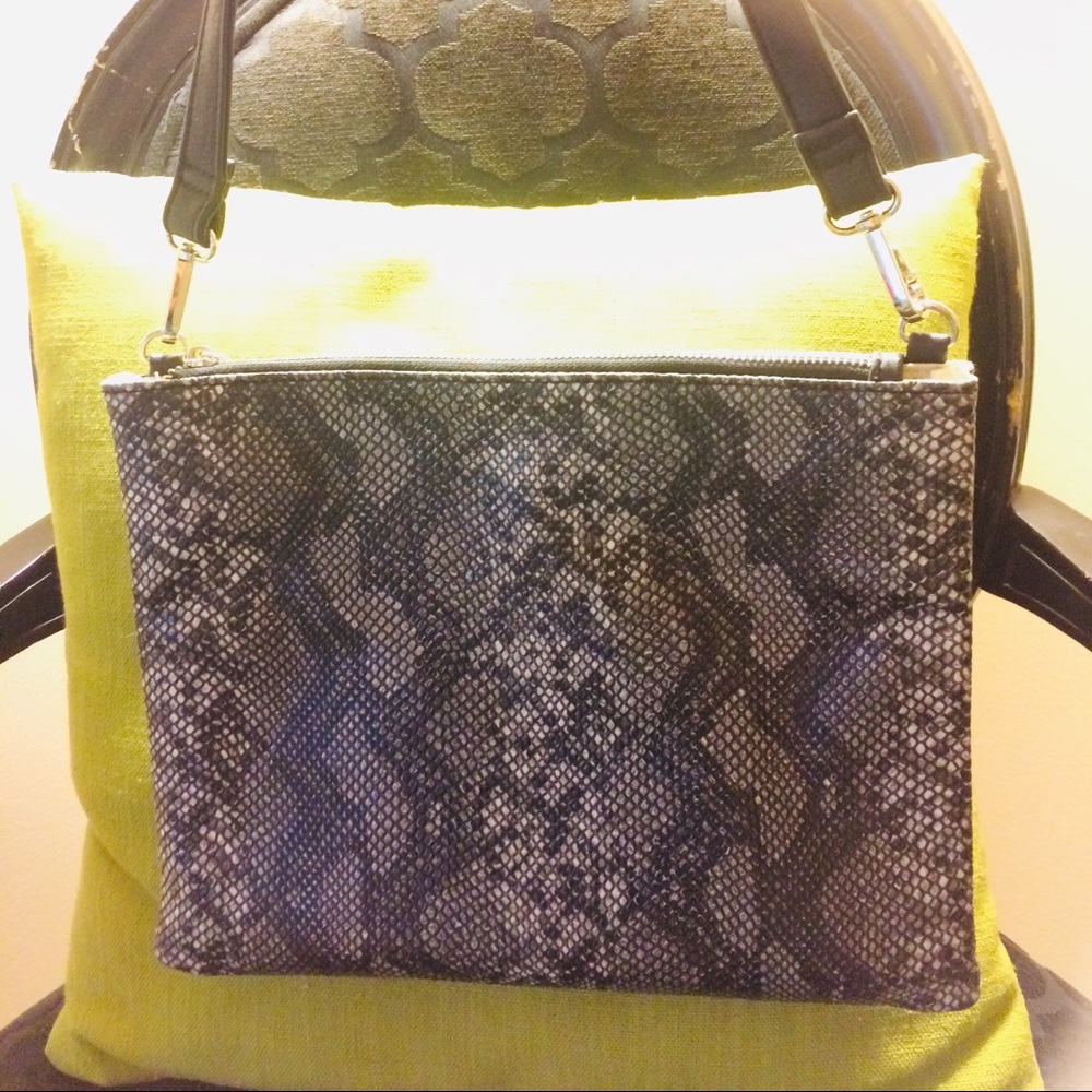 Black snakeskin purse.